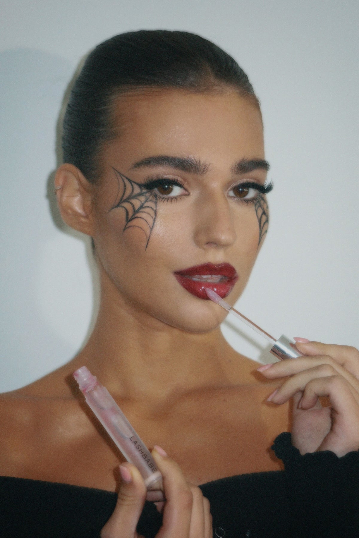Halloween spiderweb look with Lashbabe lip gloss